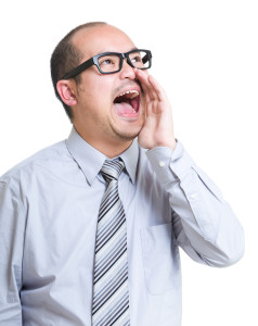 Businessman screaming