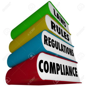 24246909-compliance-laws-rules-and-regulations-words-on-a-stack-of-books-stock-photo